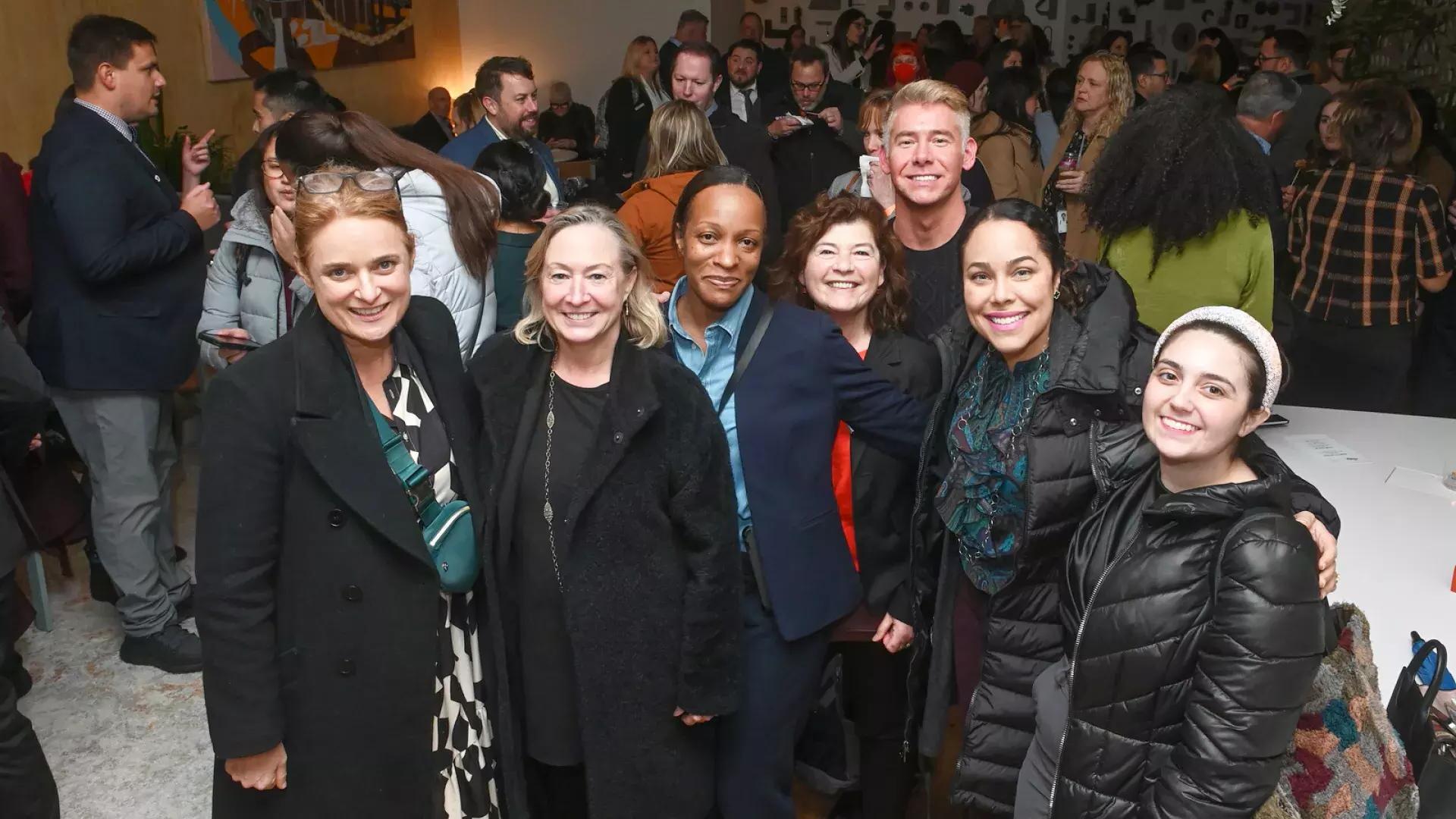 Staff and members gather at an official San Francisco Travel event.