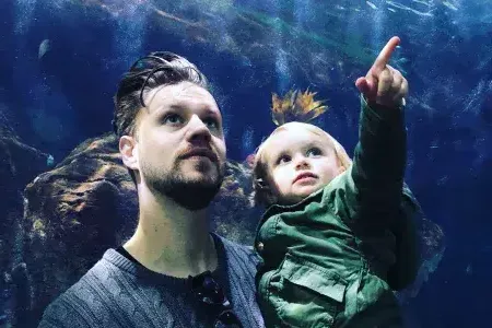 Man and child in Aquarium tunnel 